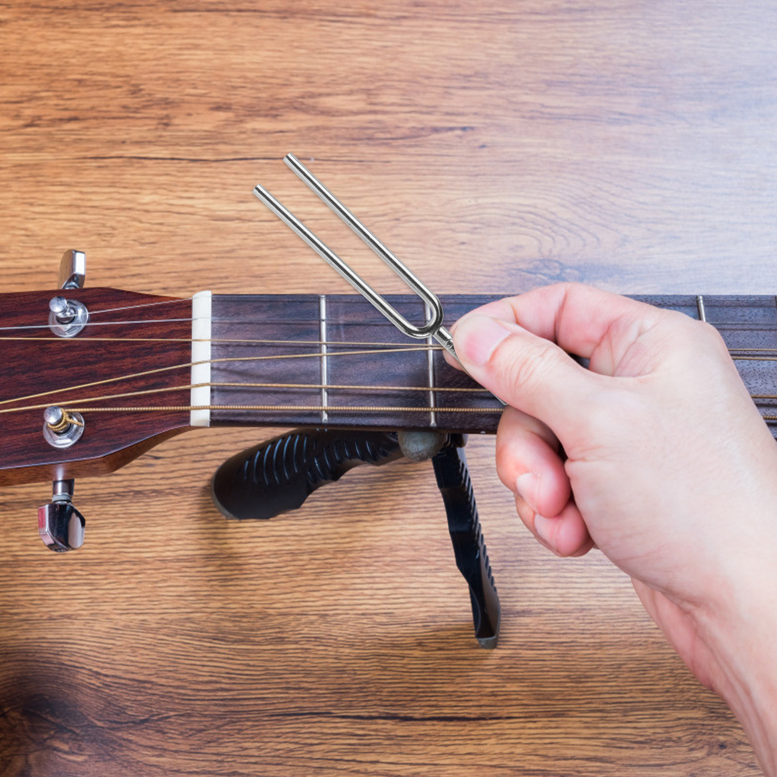 Musical Instrument Tuning Guitar Tuner. Standard Guitar Tuning - A 440Hz Tuning Fork Metal Professional